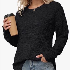 Grecerelle black side split sweater.